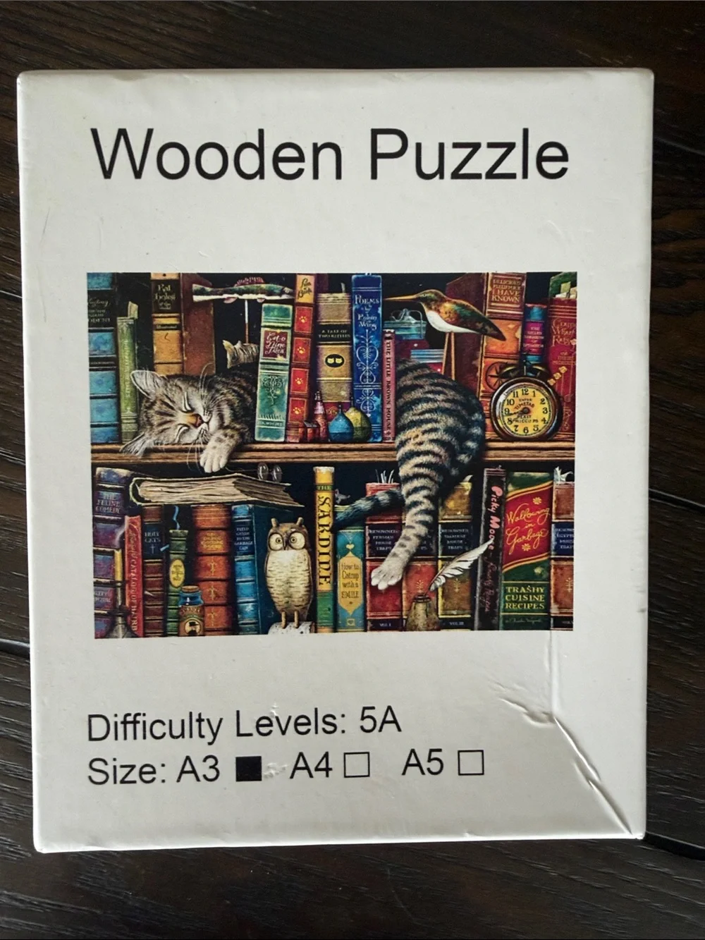 Wooden Puzzle Cat on Bookshelf